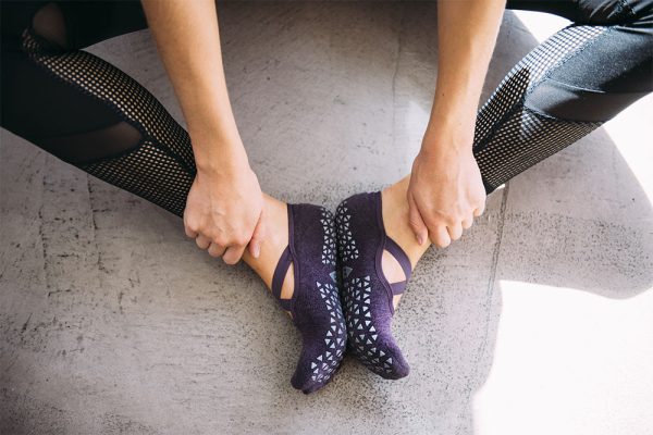 hygienisch sporten door het dragen van antislip sokken en een eigen mat