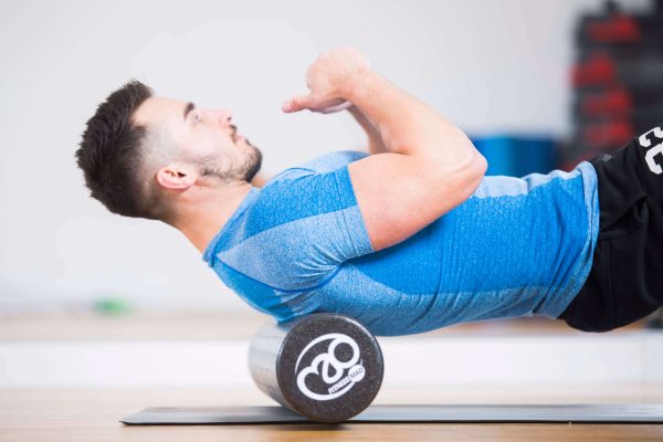 Foam roller rug om spierpijn te voorkomen of te verminderen